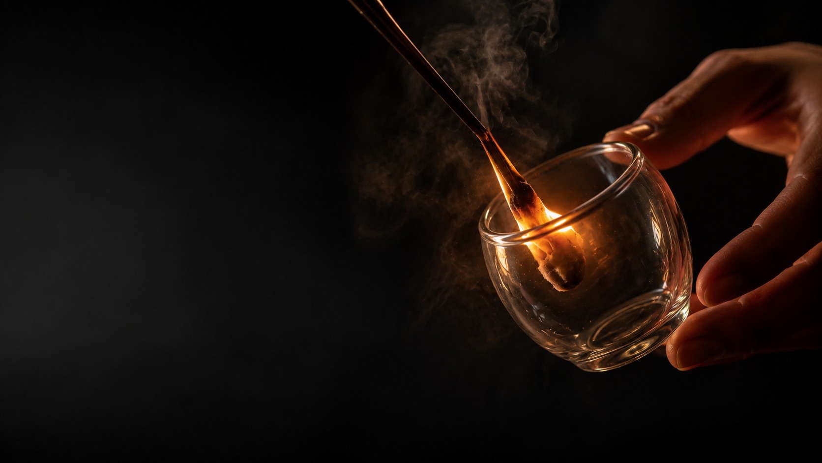 Fire cupping — flame entering the glass cup